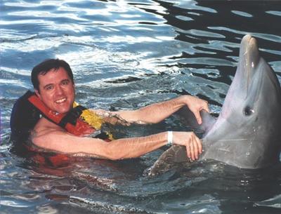 Me swimming with a dolphin