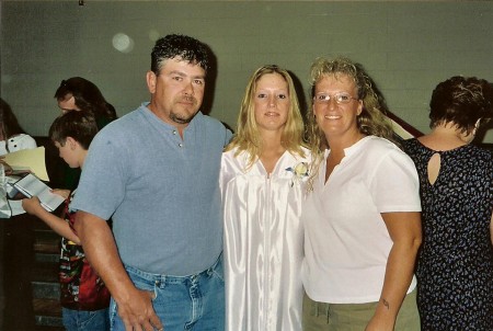 Maghen's graduation me & my husband Russ