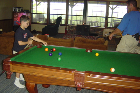 Andrew playing pool w/ Daddy.