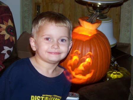 David with the pumpkin he carved