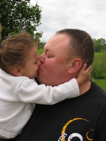 Daddy gets a smooch from Abby