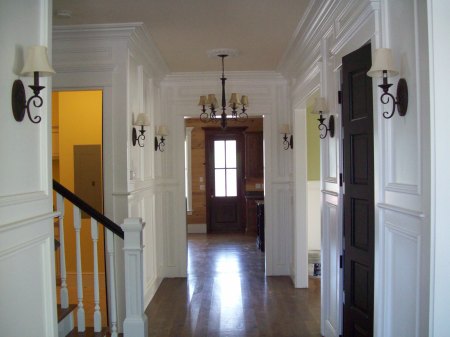 looking into foyer from front doors