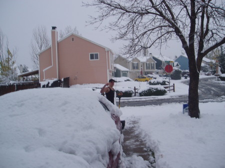 Chris shoveling the snow.