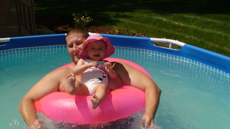Swimming with her daddy