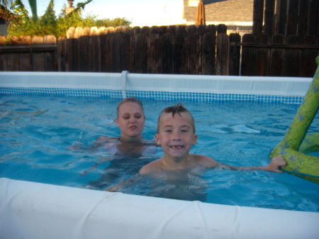 Justin swimming with his cousin