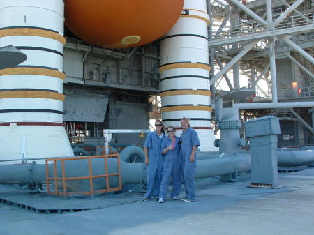 standing under rocket booster