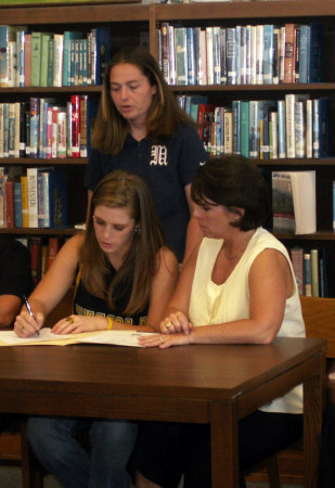 Mo signed a softball scholarship with Montreat