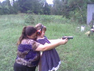 me and my daughter with my 9mm