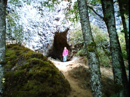 Caitlin checking out a cave at Multnomah Falls