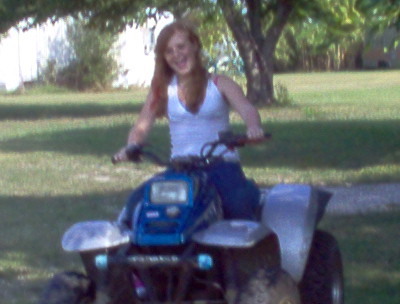 Marghe riding a four-wheeler!!