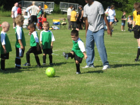 Connor kicking his first game ball