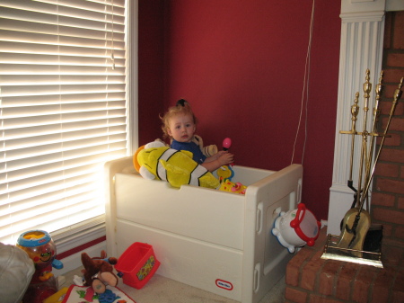 Lexi playin in her toy box