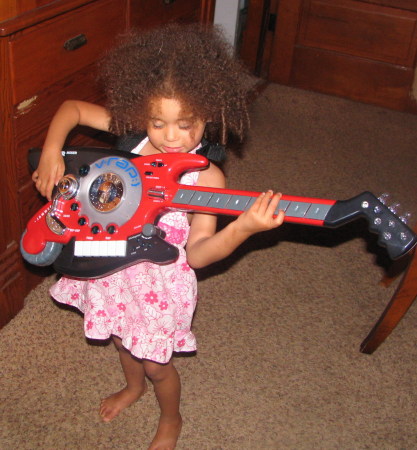 violette playing guitar