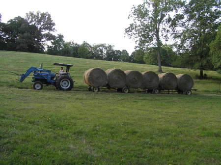 Jay moving a "few" bales of hay...