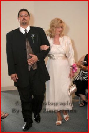 JR escorting his Mom, Lynnae into wedding