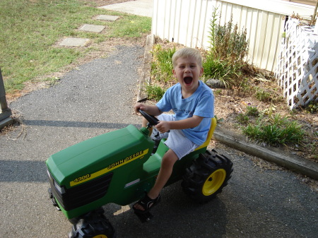 Ethan on his tractor