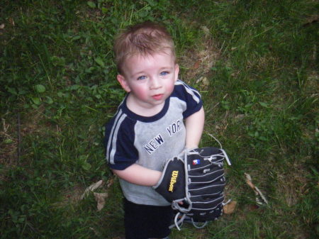 Brayden playing baseball