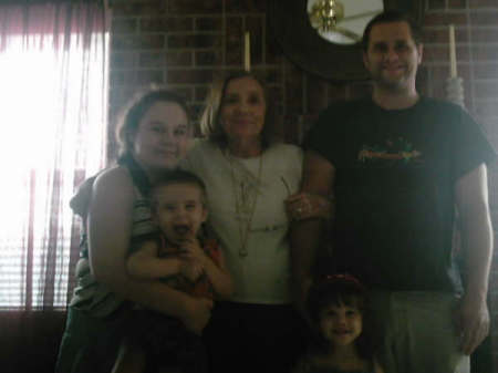 My mom & Tony & his family
