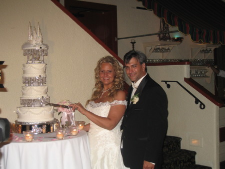 Bride and Groom with the Wedding Cake.