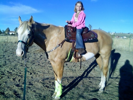 Cassie riding her horse