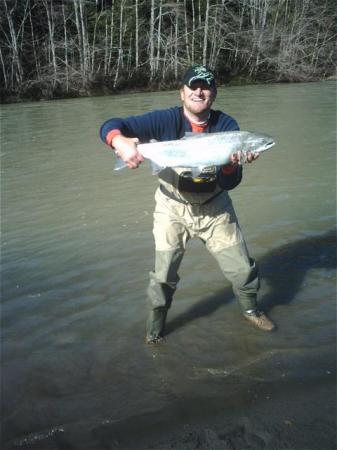 My husband with his 15lb. steelhead trout