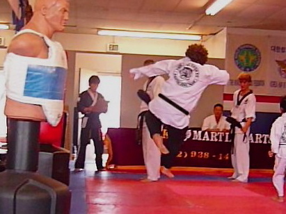 Cody testing in Taekwondo