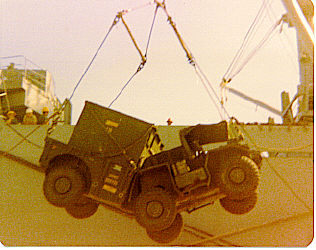 Loading radio equipment USS Charleston