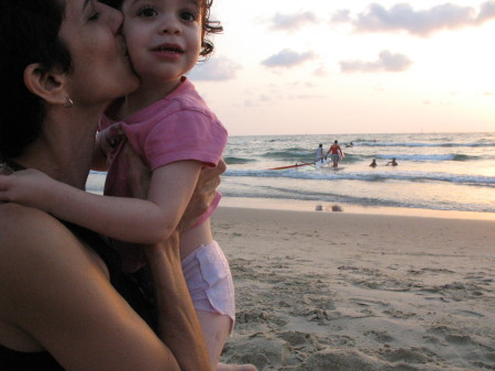 k and e on beach kiss