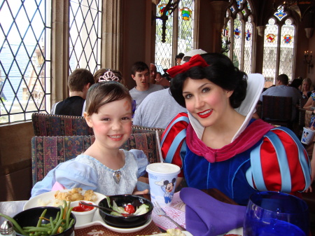 Myah with Snow White in the caste for dinner.