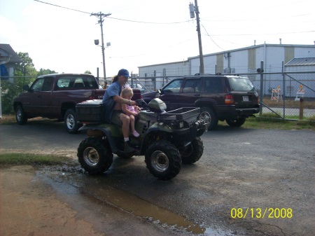 Kylie and papaw on the 4 wheeler