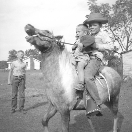 GREG GIVING BROTHER GIL A RIDE