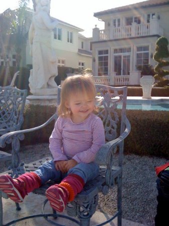 Abrielle (Kristen's)sitting on dock with Poppy