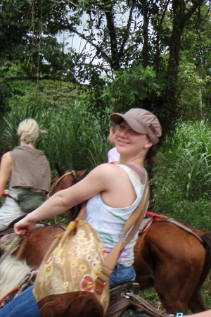 Rhea horseback riding in the rainforrest