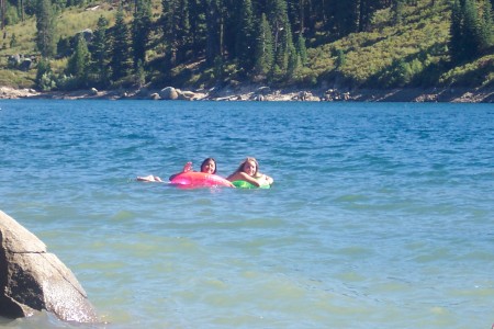 Emma and Kayla floating on the lake.