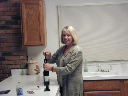 Mary Jo opening us some wine
