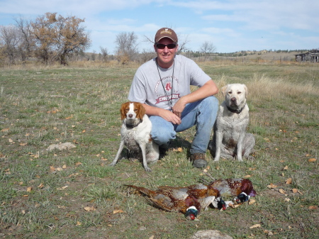 three muddy hunters