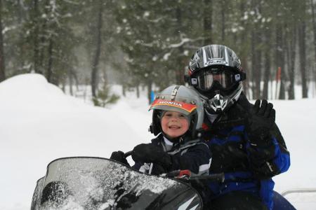 Karla & Tanner snowmobiling 12/07