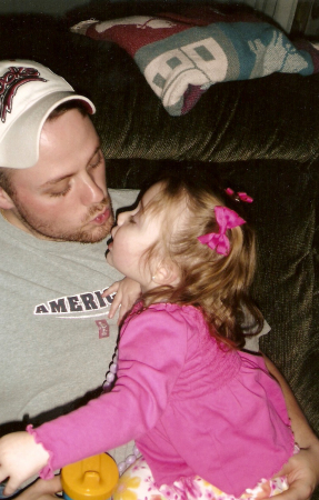 Brooklynn giving her daddy a much needed kiss.