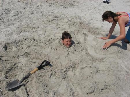 My daughter Bri burying my youngest son Dustin