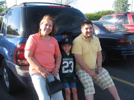 Youngest son with Abuela and Uncle