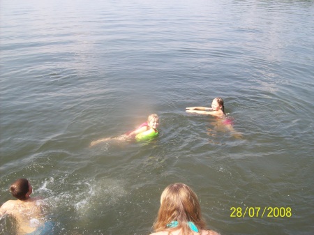 grandchildren swimming at the lake