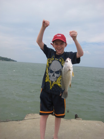 Kyle catching fish of of the pier Mentor OTL