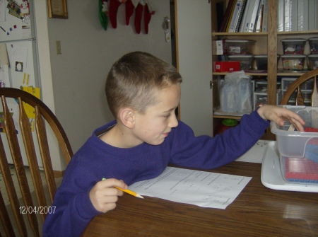 Nic doing school work