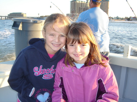 Girls on fishing trip with daddy