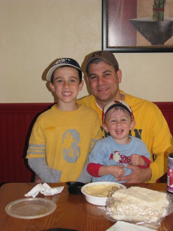 Adam, Daddy & Jacob eating hummus.