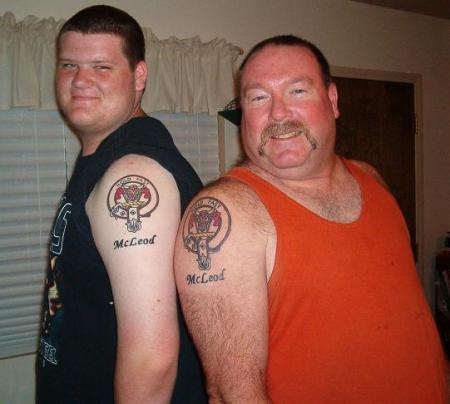 Guy and son David's "McLeod" tattoos