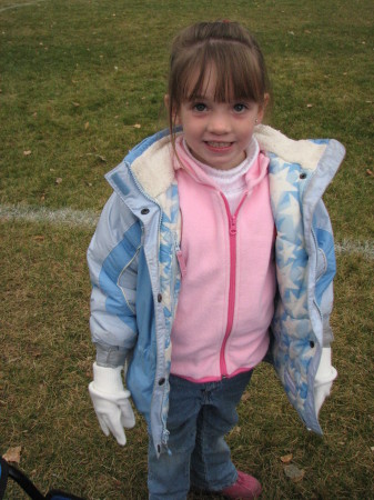 Karissa watching Braden football game