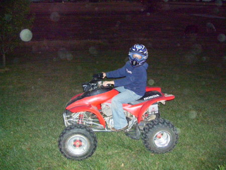 Cole on his 4-wheeler-Loud!!