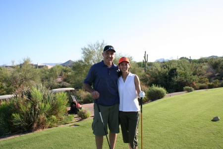 my husband and I golfing in Arizona