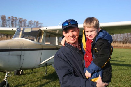 Austin and Daddy after flight
